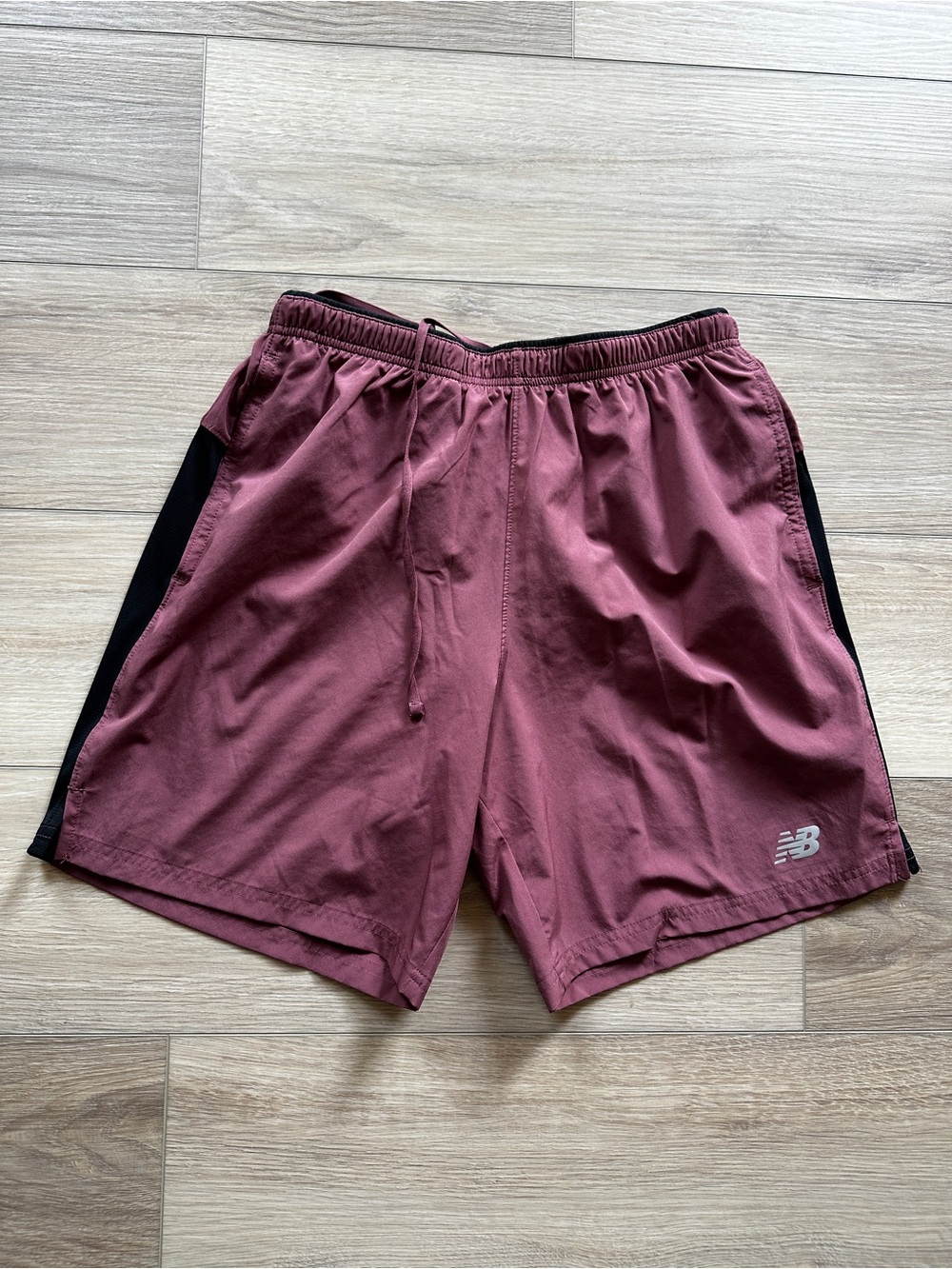 New Balance Men's light Mario  Athletic Shorts with Black Side Panels